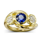 Sapphire Diamond Trilogy Ring by Pruden and Smith | gold-sapphire-and-diamond-inwards-spiky-trilogy-ring.jpg